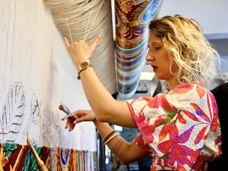 REPORTAGE. À Lodève, Gaëlle tisse les plus beaux tapis de la République