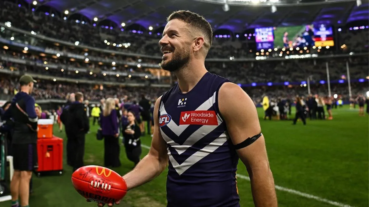 Fremantle fan favourite Sam Switkowksi puts family first with shock retirement call
