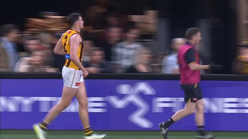 Lewis hurts shoulder in airborne contest