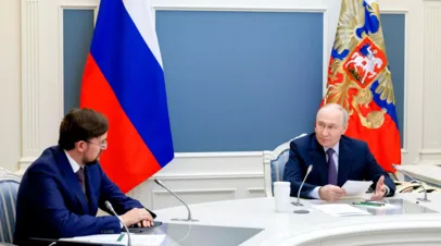 Зарубин: Путин на форуме в шутку погрозил кулаком Репику