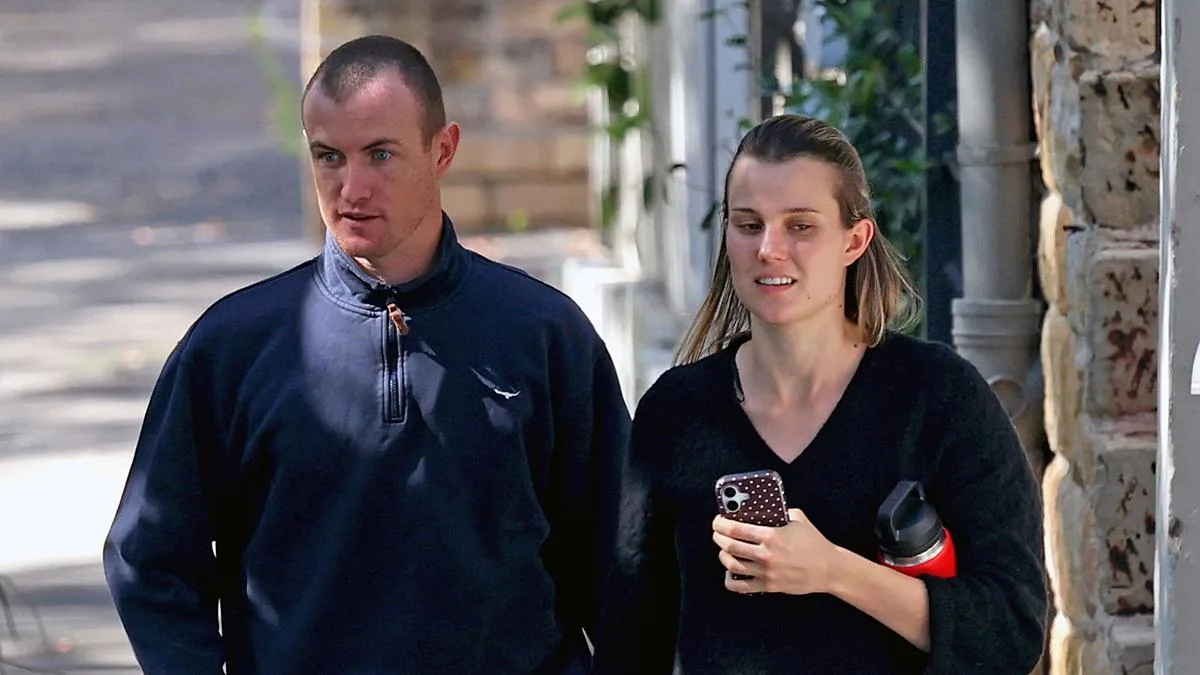 Chad Warner makes first public appearance as suspended Sydney Swan spotted with partner Alice Hughes