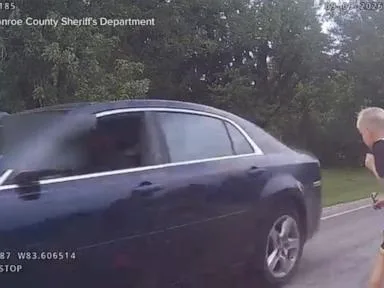 WATCH: Police: Michigan driver nearly hits student crossing street from school bus