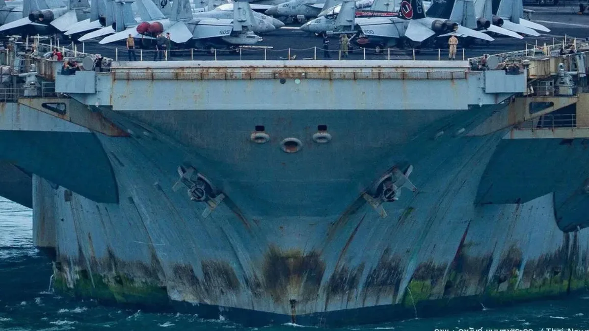 Rusty & faded: USS Lincoln with 5,000 war-weary sailors docks in Thailand