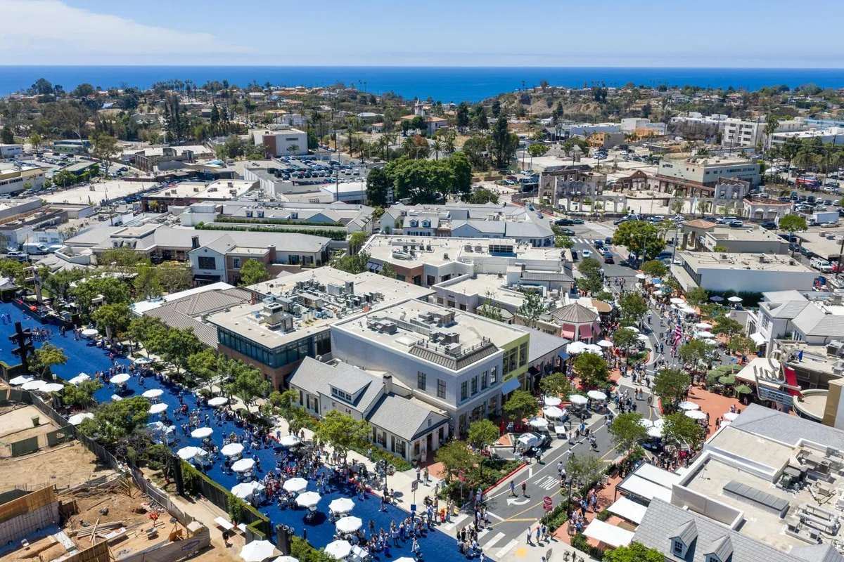 Palisades Village shopping center reopens, marking milestone for fire-weary community