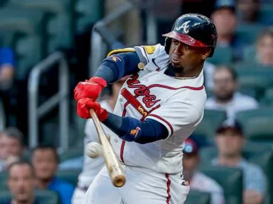 Albies drives in winning run in the 8th, Braves win 4-3 to snap Dodgers 6-game winning streak.