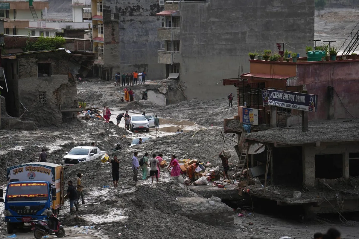 British volunteer aid worker says he was mistaken for floods survivor