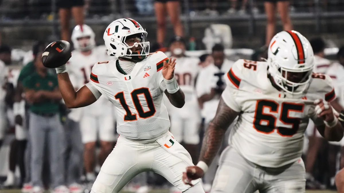 Mensah sets ACC consecutive-completions marks, defense rises in 4th as No. 5 Miami tops Wake Forest