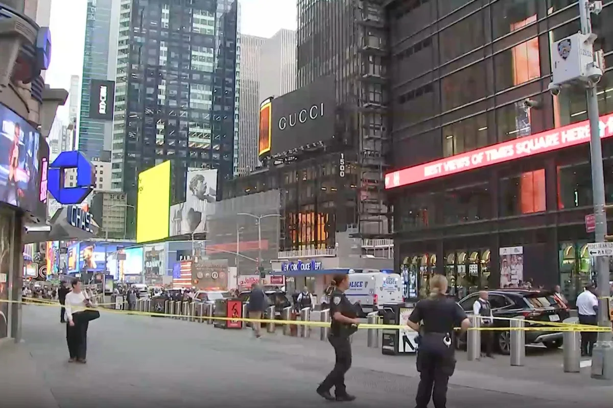 Woman shot dead by police in Times Square after fatally stabbing one and injuring another