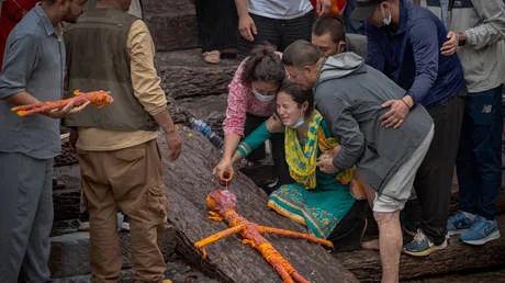 Nepal rescuers delayed by mud and water in tunnels – PM
