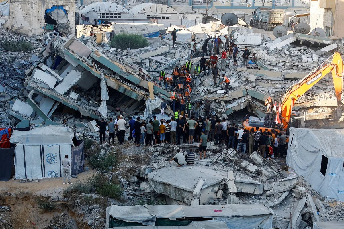 Building collapse in Gaza kills at least 21 people including eight children seeking shelter