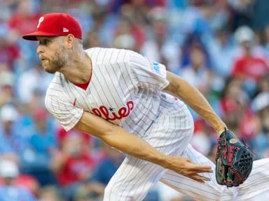 Wheeler fans 9 in 6 sharp innings, Schwarber hits 41st homer to lift Phillies past Braves 4-2