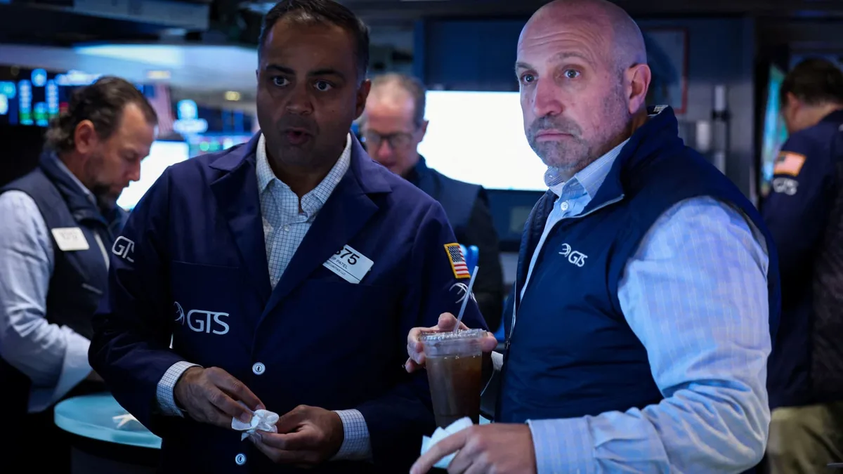 Treasury yields are lower after reaching multiyear highs, traders weigh latest bond auction