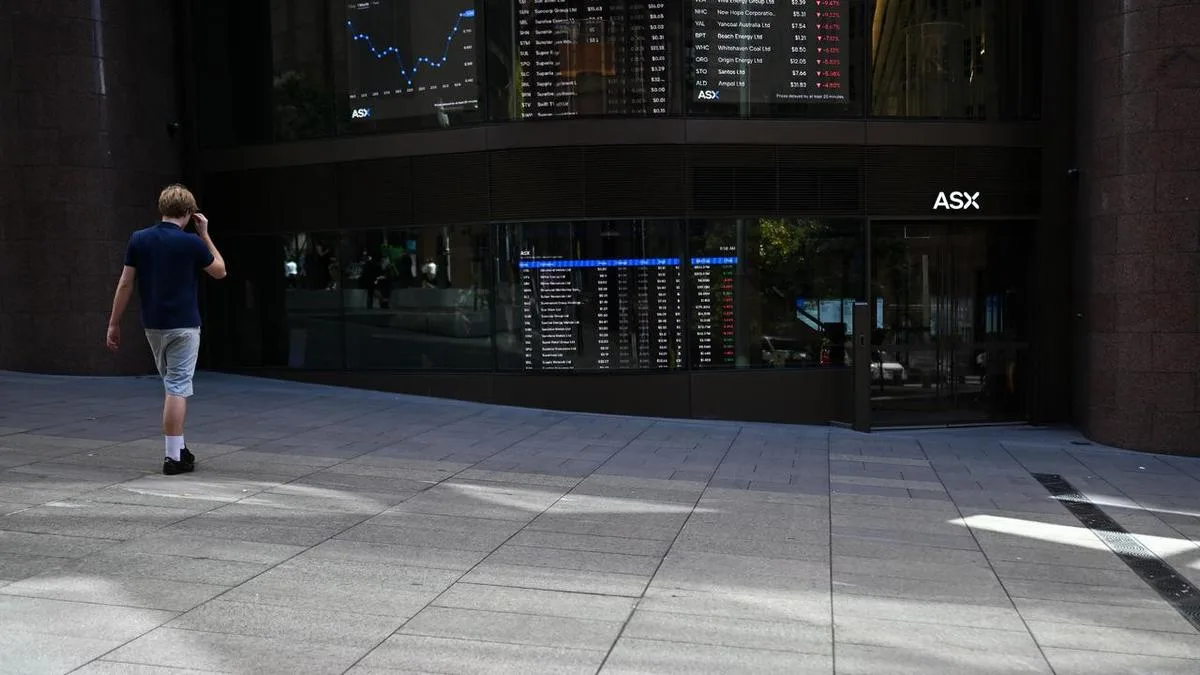Aussie shares sink back into red as bond yields spike