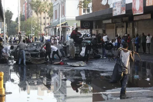 IN PICS | Torched cars, damaged businesses as anti-immigration protests rock Durban and Soweto