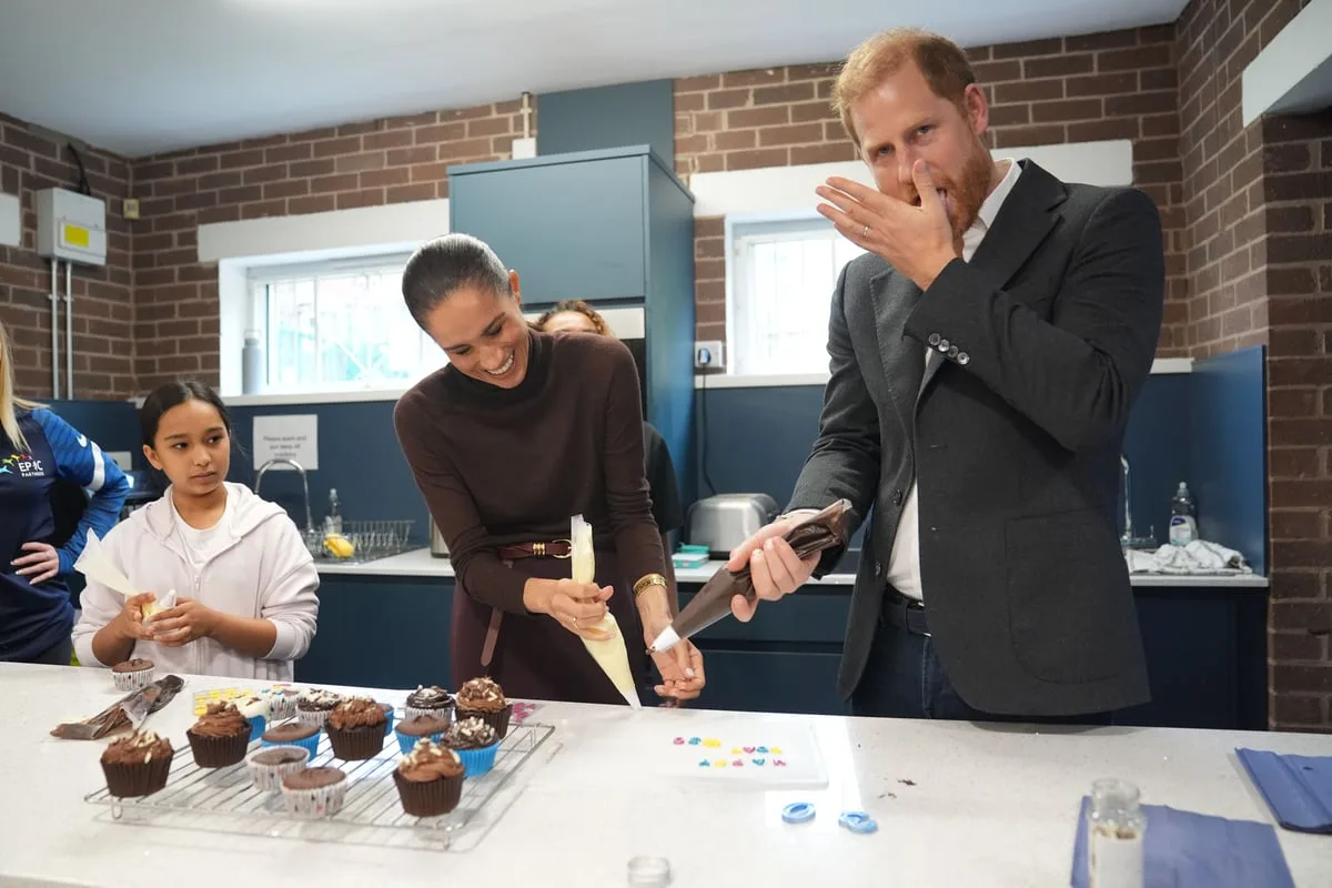 Royal icing proves beyond Harry’s talents as he and Meghan take on cupcakes task