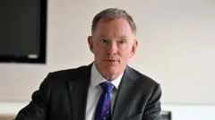 NI secretary holding Stormont talks over budget deadlock