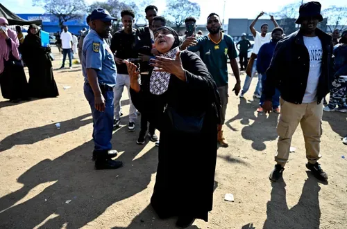 Burnt cars, looted shops and anger linger in Soweto after Home Affairs asylum U-turn