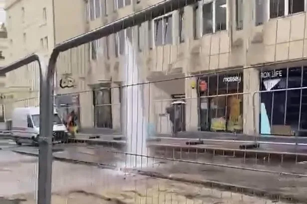 Floods bring chaos to busy street leaving businesses and homes without water