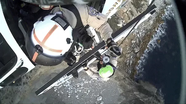 Helicopter rescue crew caught on camera saving 2 climbers trapped along popular California beach cliff