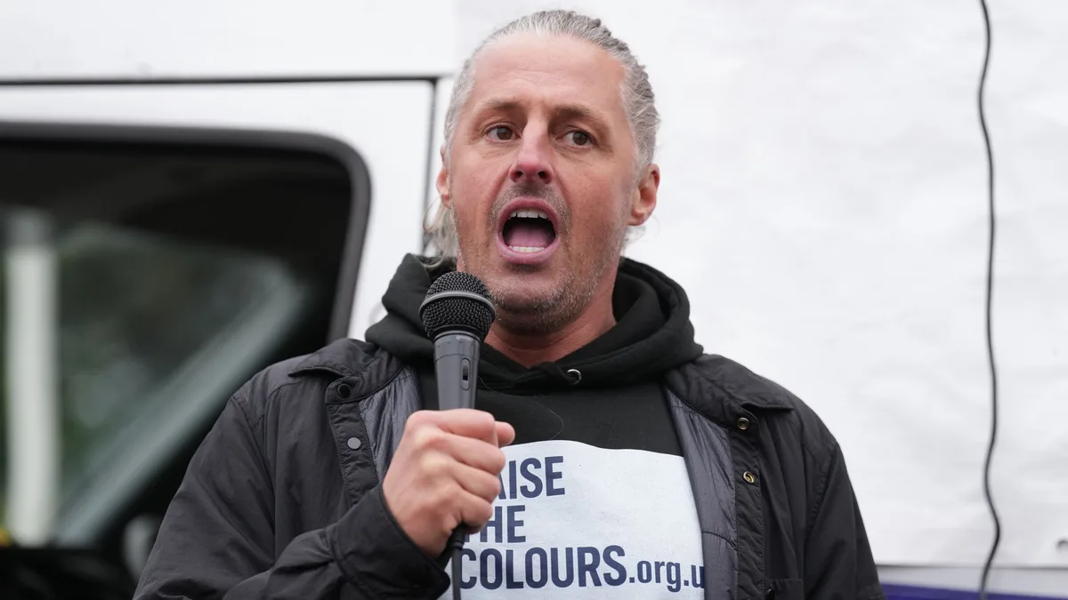 Founder of group that put flags on lampposts charged with 14 offences