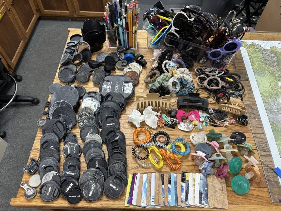 What was found among 20K pieces of trash pulled from Yellowstone hydrothermal areas