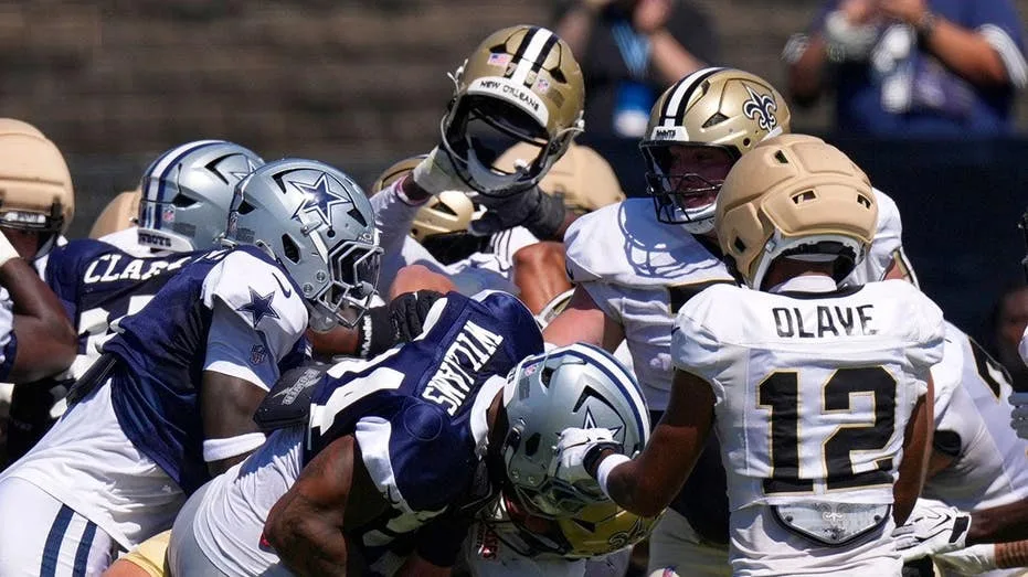 A massive brawl at Cowboys and Saints joint practice includes punches and helmets thrown and WWE moves