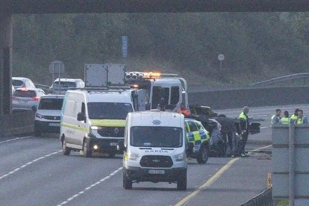 Car crashes through flyover railings and falls onto busy M50 in Ireland