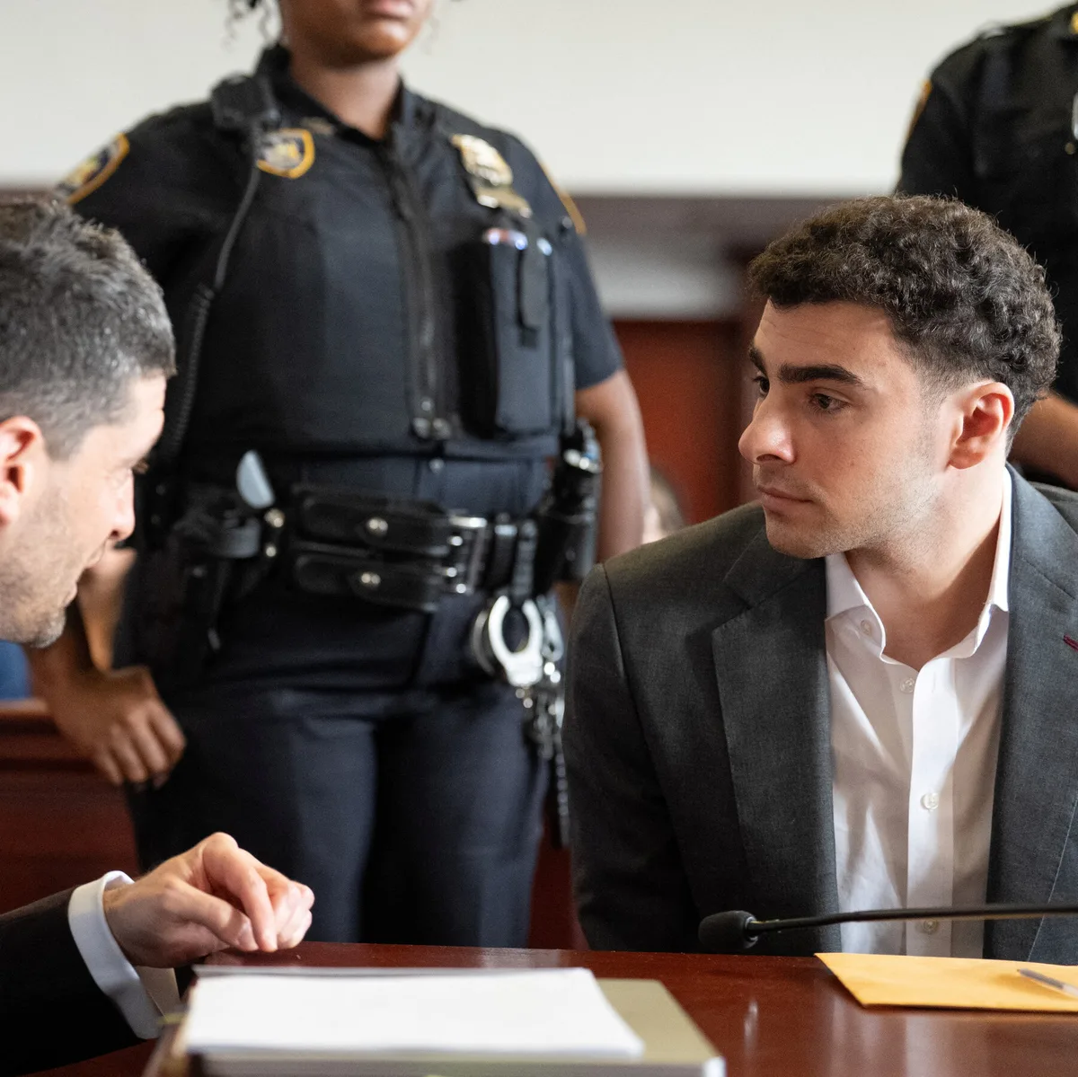 Mangione’s State Trial Is Delayed as His Lawyers Seek Dismissal