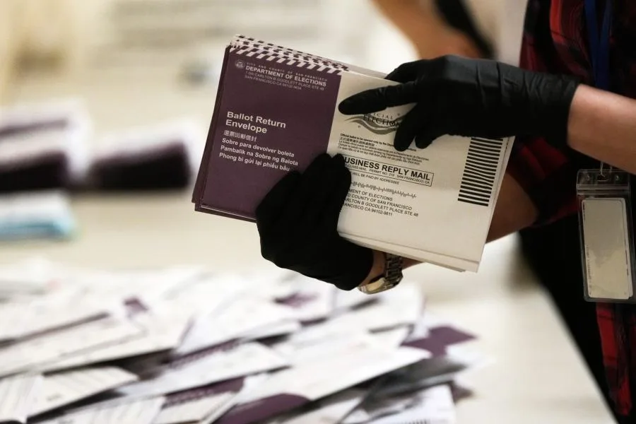Blue states launch new suit to stop Trump's mail-in voting restrictions