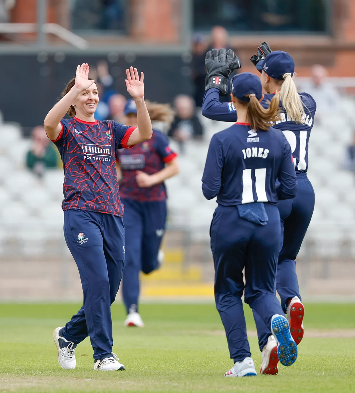 Kate Cross, Sophie Morris keep Lancashire title defence alive