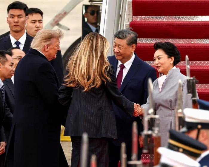 Trump greets Xi Jinping at plane as Chinese leader arrives for state visit