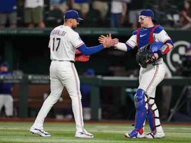 Rangers reach .500 again and tie for AL West lead with 7-3 victory over Red Sox