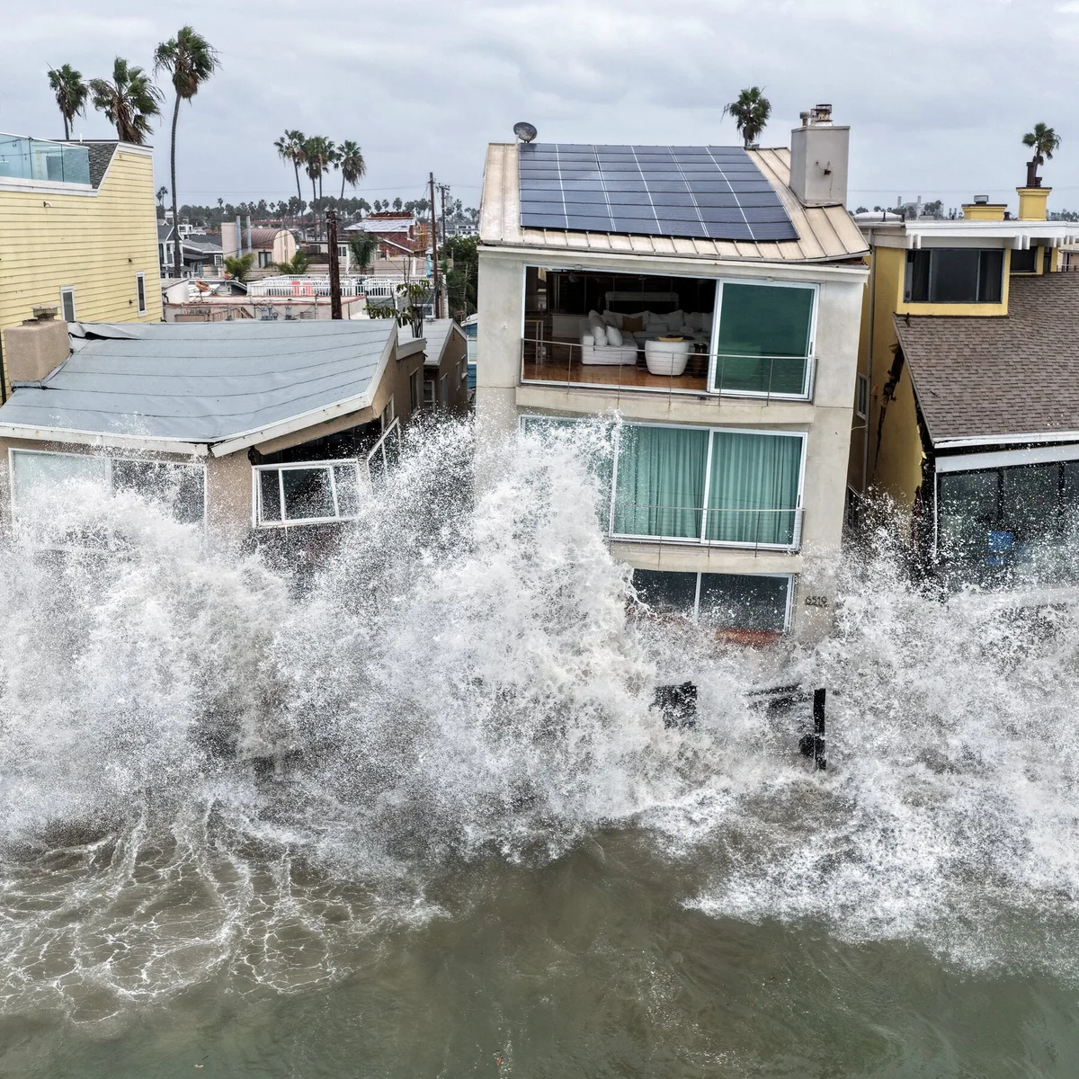 Waves From Powerful Storm Pound Beach Homes in Southern California