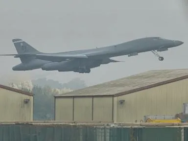 A British man is bailed after his arrest in security incident at a US-run military base in England