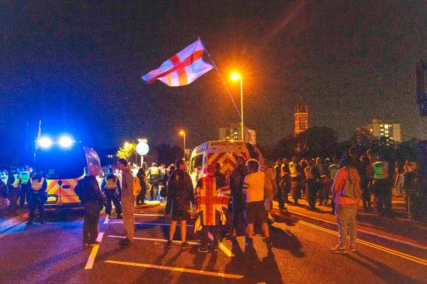 Migrants finally arrive in Dover after six protesters arrested in clashes with police