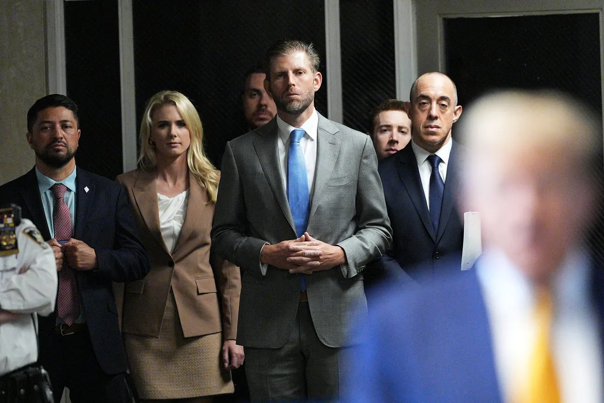 Trump’s relationship with aide Natalie Harp becomes family affair as son Eric weighs in