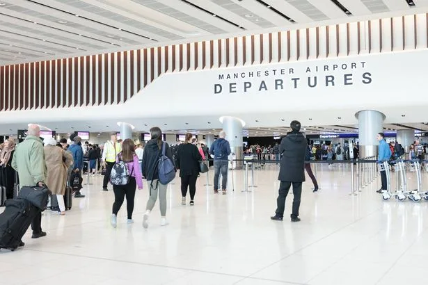Manchester Airport live: Widespread delays to flights after 'hole in runway'