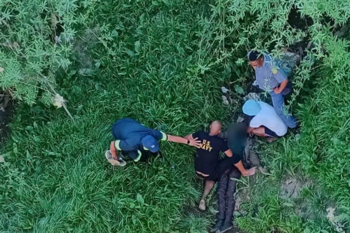 Rescue teams save man who 'heard voices' before river fall