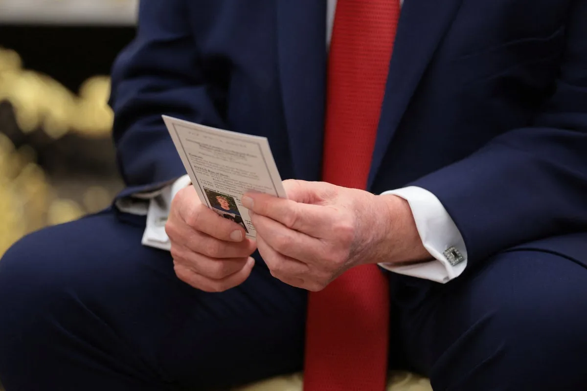 Photos show Trump relying on cheat card for White House event – something Republicans lambasted Biden for