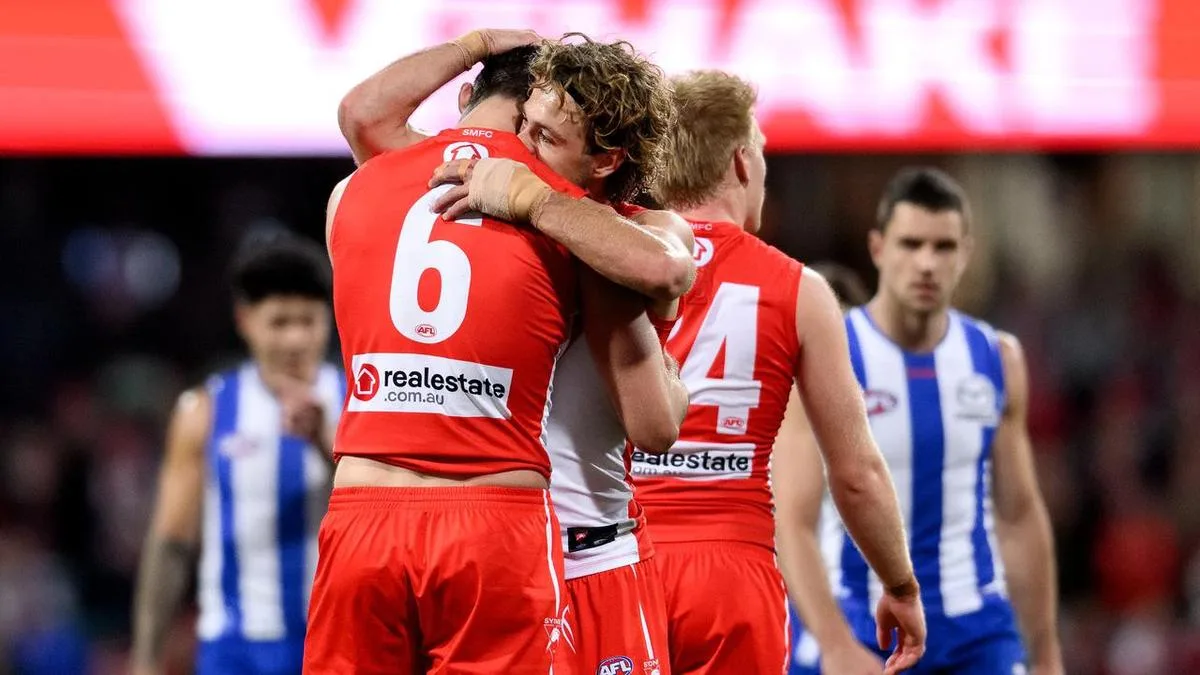 Swans win first AFL game after hotel scandal