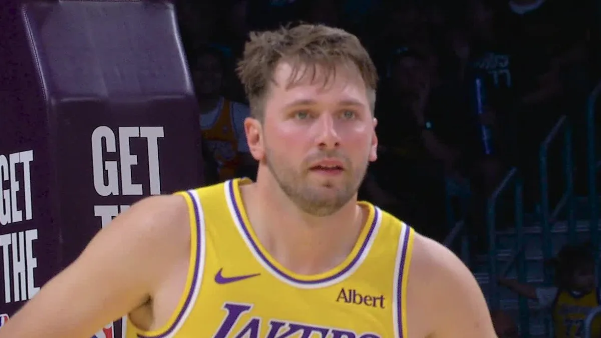 Lakers’ Doncic buries three from logo to beat shot clock