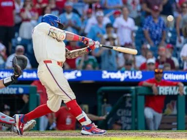 MLB home run leader Schwarber punctuates Phillies' unlikely comeback win over the Cardinals