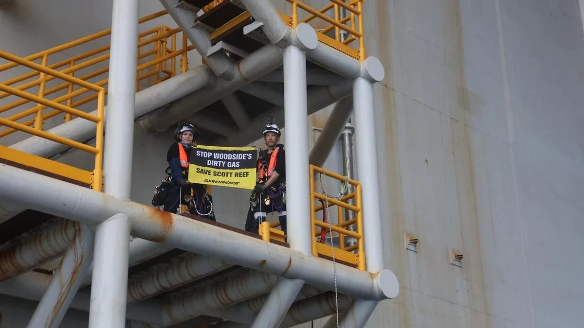 Activists in custody after scaling Woodside gas rig