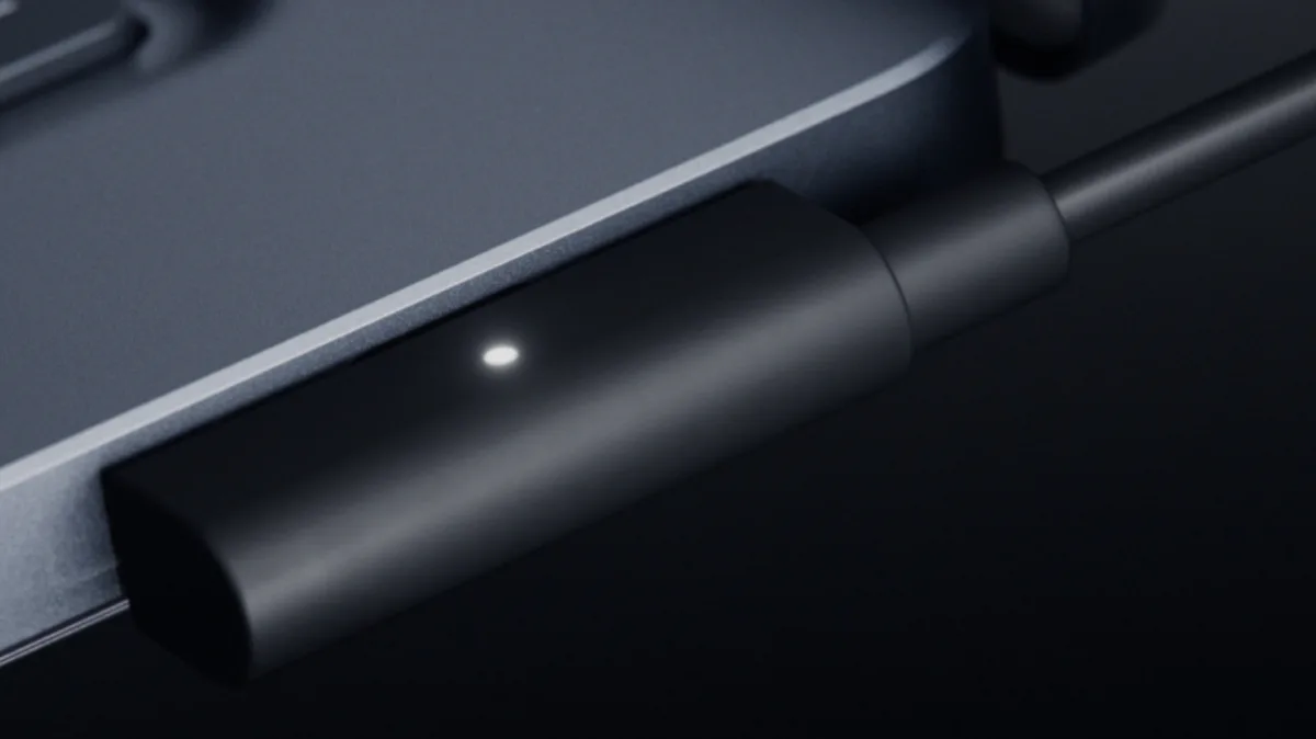 How is Microsoft's Magnetic Connect different from Apple's MagSafe for MacBooks?