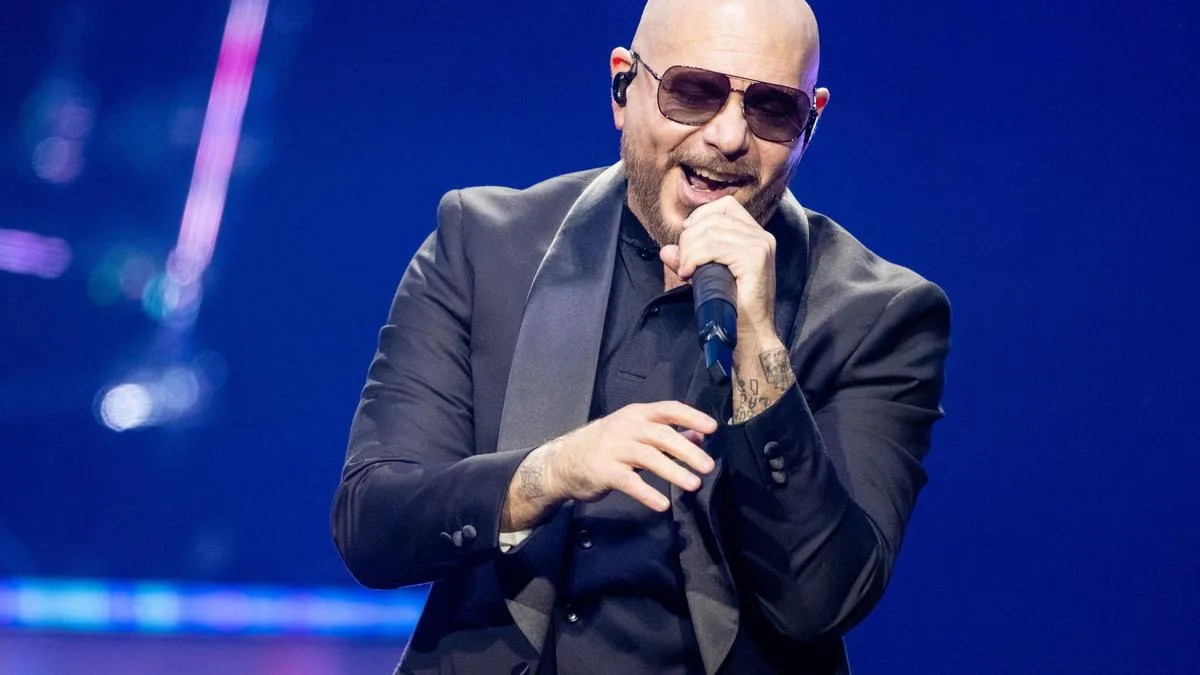 Pitbull says Dolly Parton 'believed in me when a lot of folks didn't' in moving tribute