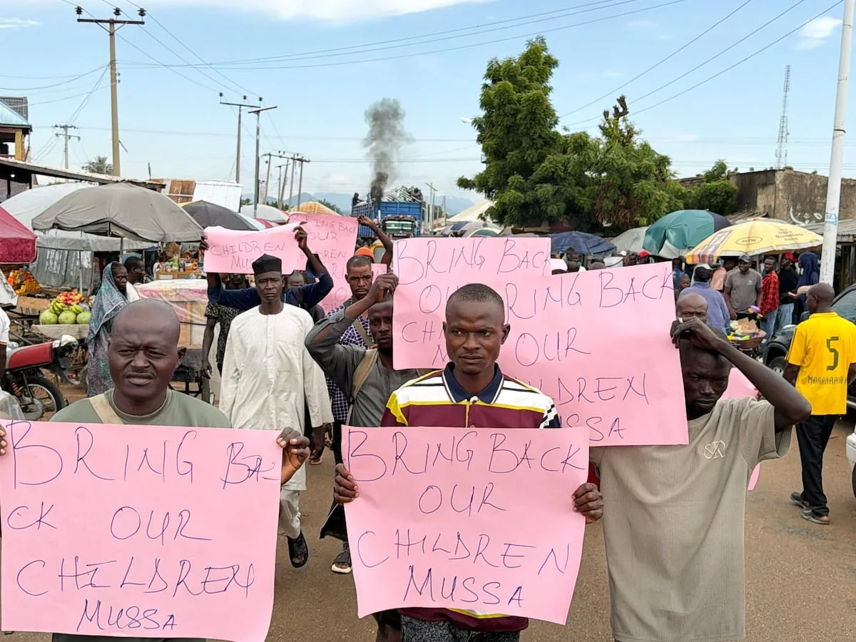 Nigerians protest as hundreds remain captive a month after mass kidnapping