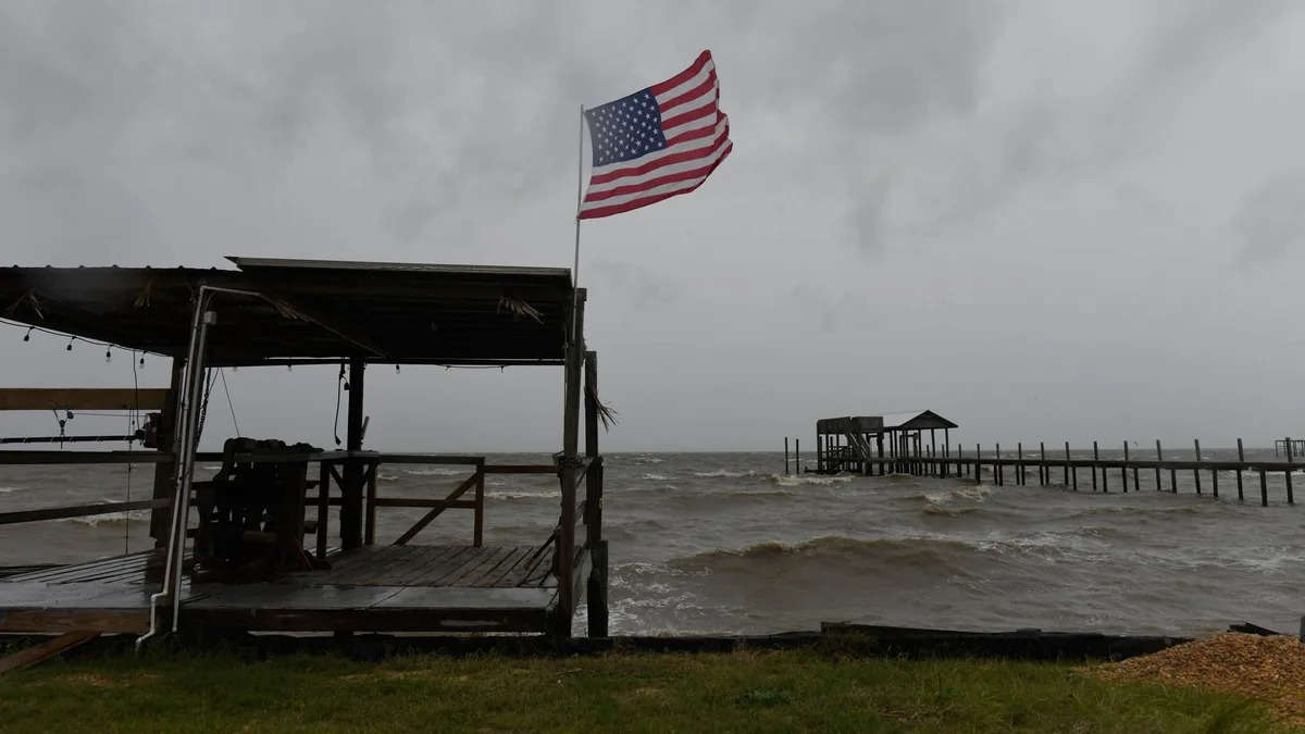 'The storm is here - buckle down': Hurricane Isaias makes landfall in US