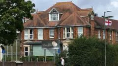 Attempted murder arrest at Surrey asylum hotel
