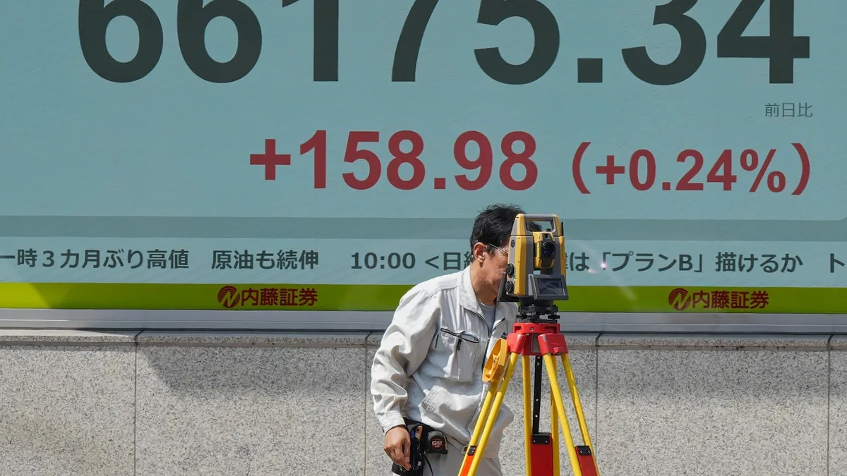 Asian shares mostly decline as bond market pressure mounts