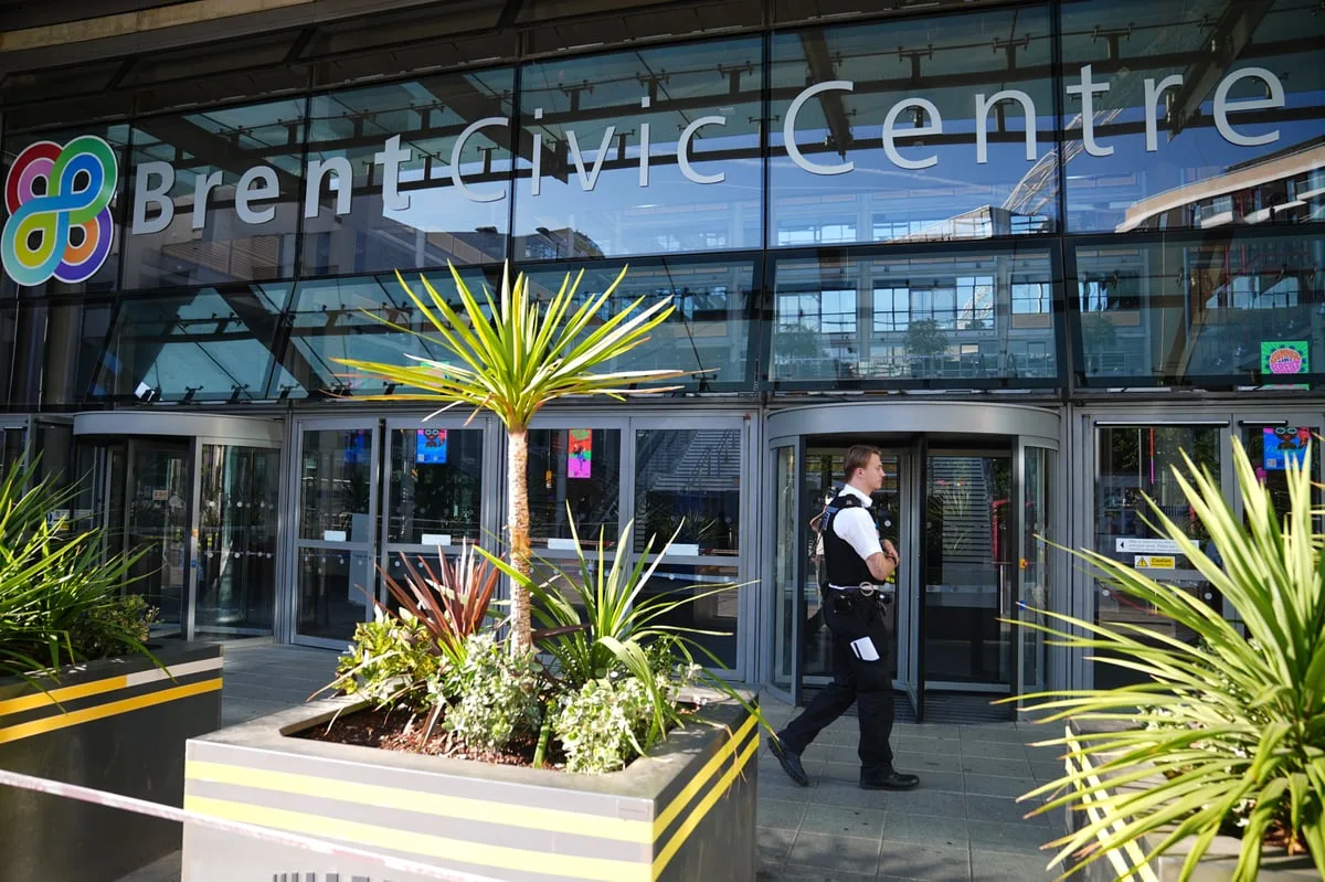 Young man 'stabbed to death at council headquarters' in north London
